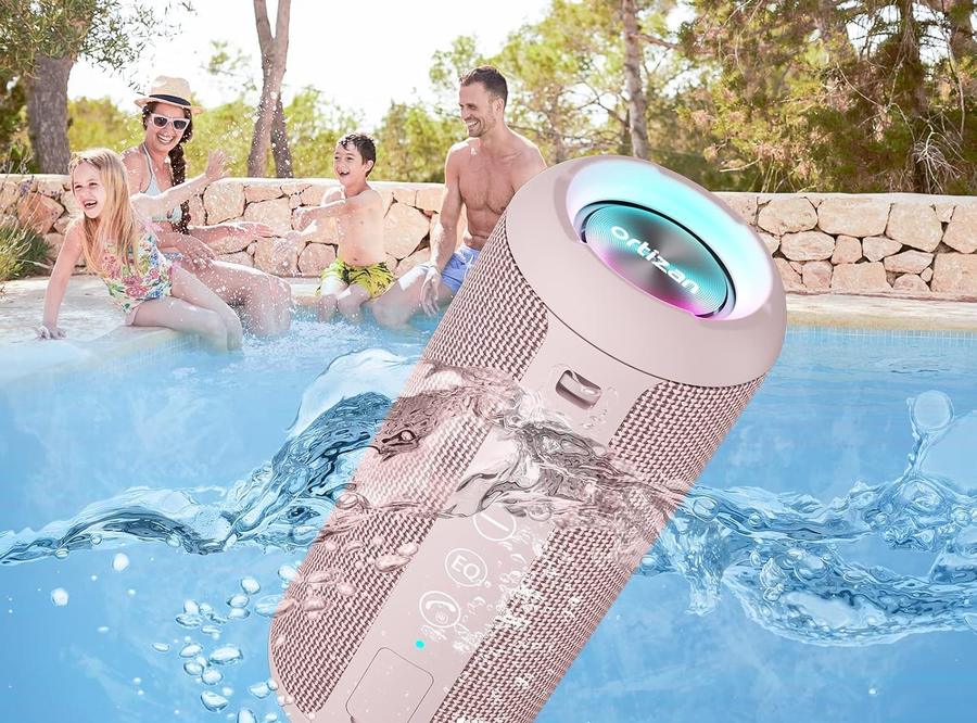 Ortizan X10 in pink beside a pool with a family in the water